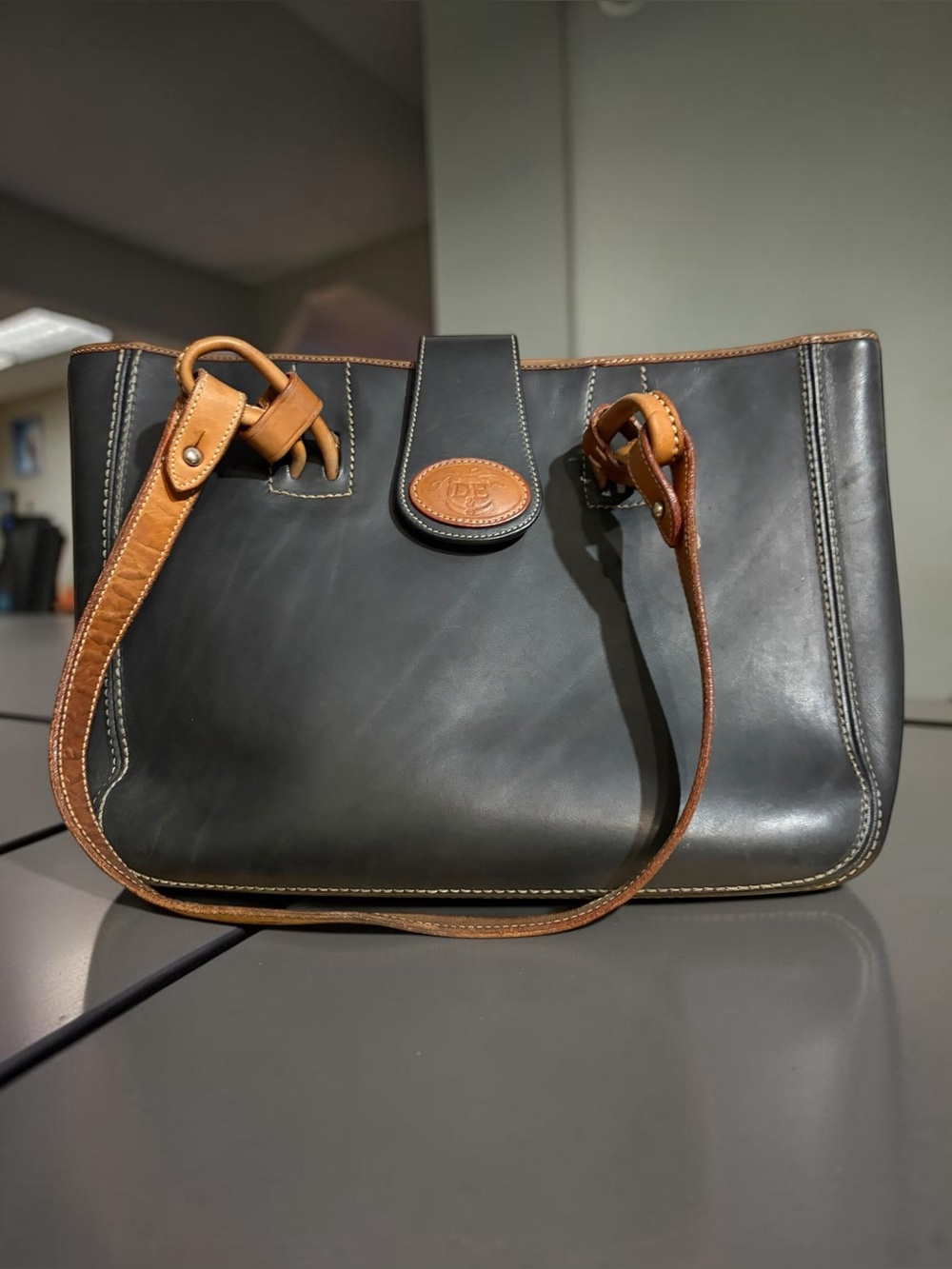 Dooney & Bourke Black Leather Briefcase with Brown Trim